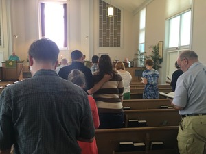 Singing at worship. Singing at worship.